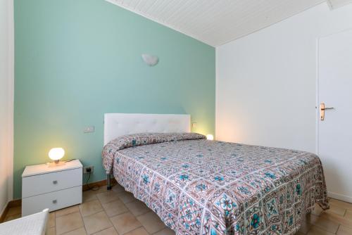 Postel nebo postele na pokoji v ubytování Il Quadrifoglio 2