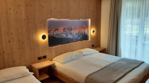 Fotografie z fotogalerie ubytování Hotel Garni Arnica v destinaci Molveno