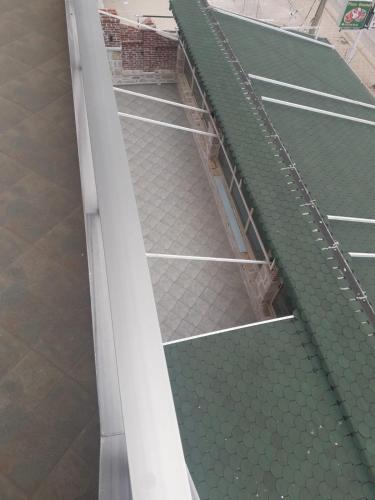 an overhead view of a tennis court at Hotel Arsenal in Ksamil