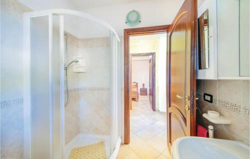 a bathroom with a shower and a sink at Villa Antonella in Castelsardo