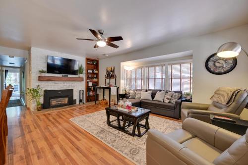 a living room with a couch and a fireplace at Peaceful Deck and Fire Pit Payson Home! in Payson