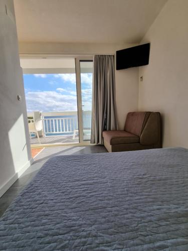 Posteľ alebo postele v izbe v ubytovaní Apartmani Apollo - Drasnice