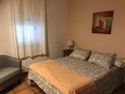 Postel nebo postele na pokoji v ubytování Casas El Molino