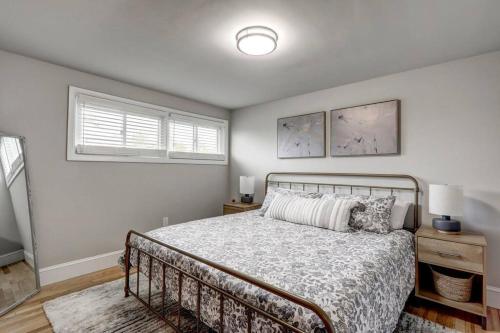 a bedroom with a bed and a window at New cozy home near Outlets & Amish Country in Lancaster