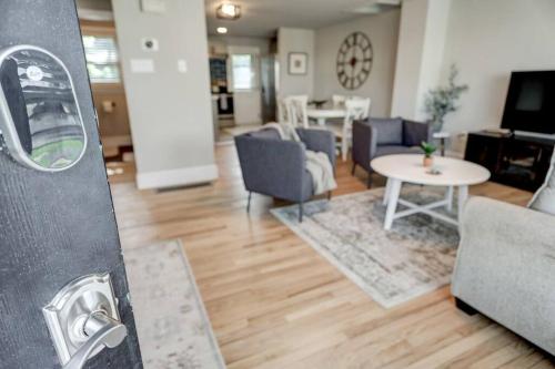 a living room with chairs and a table and a living room at New cozy home near Outlets & Amish Country in Lancaster