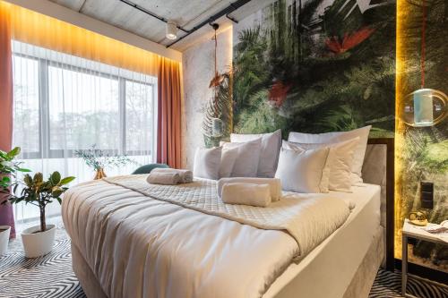 Katil atau katil-katil dalam bilik di Hotel Zoo by Afrykarium Wroclaw