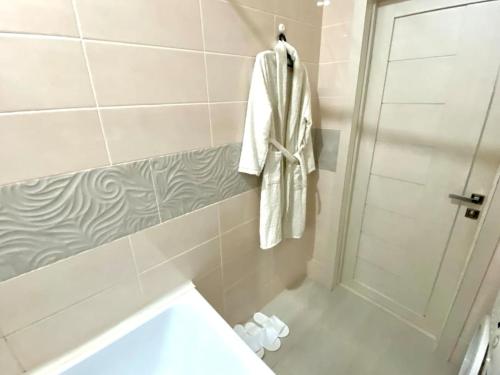 Koupelna v ubytování Уютная квартира в центре города