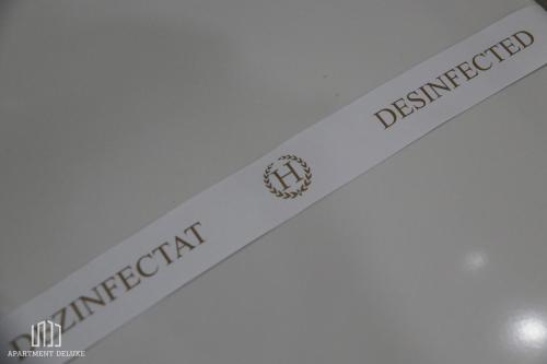 a close up of a white ceiling with the words denseroco catalyst at Apartment Deluxe in Jajce
