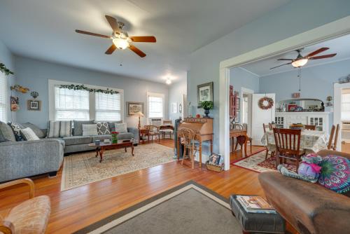 a living room with a couch and a table at Charming Canyon Lake Cottage with Pool and BBQ Pit! in Canyon Lake