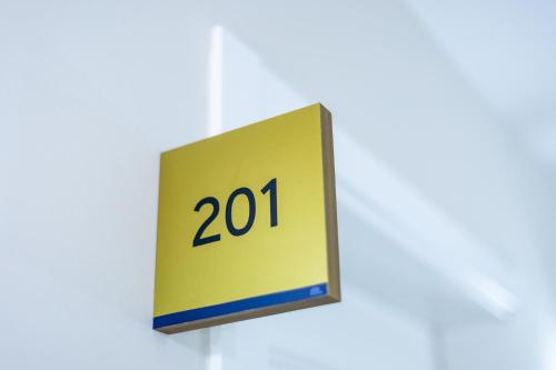 a sign that reads hanging on a wall at Casa do Estanco in Quiroga