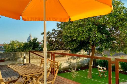 Central 2 bedroom apt with Garden and Pantheon Views by Lisbeyond