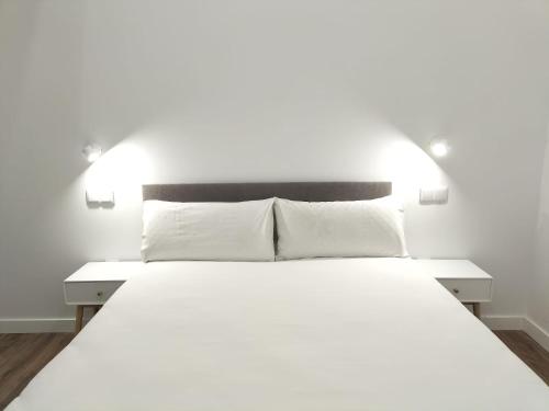 Postel nebo postele na pokoji v ubytování Apartamentos Vacceas by gaiarooms