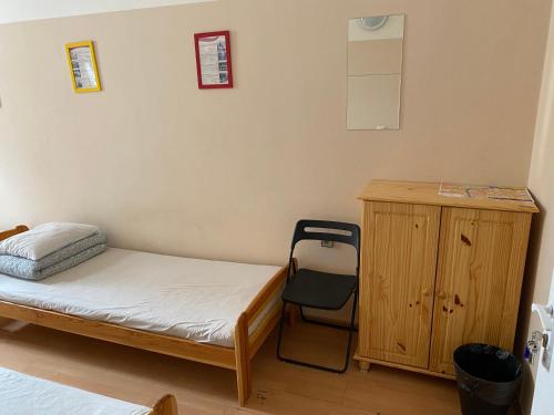 Una cama o camas en una habitación de Hostel EMMA