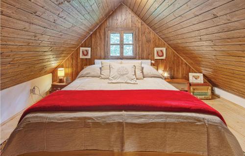 a bedroom with a large bed in a attic at 5 Bedroom Awesome Home In Novi Marof in Novi Marof