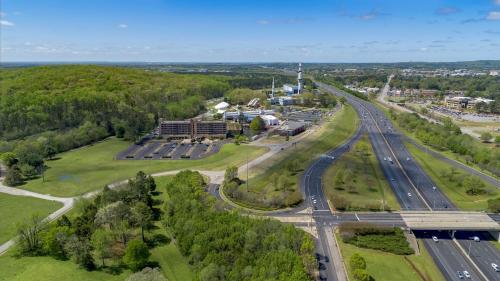 an aerial view of a city with a highway at Holiday Inn Express - Huntsville Space Center by IHG in Huntsville