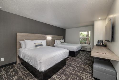 a hotel room with two beds and a window at Montclair at Zion in Springdale