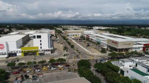 an aerial view of a city with a parking lot at Mami Yola in Valledupar