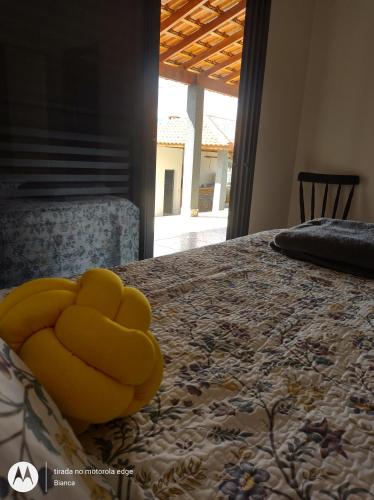 Postel nebo postele na pokoji v ubytování Nosso Canto Casa de Hóspedes
