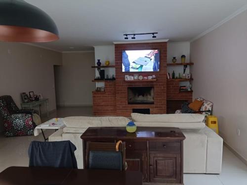 TV a/nebo společenská místnost v ubytování Nosso Canto Casa de Hóspedes