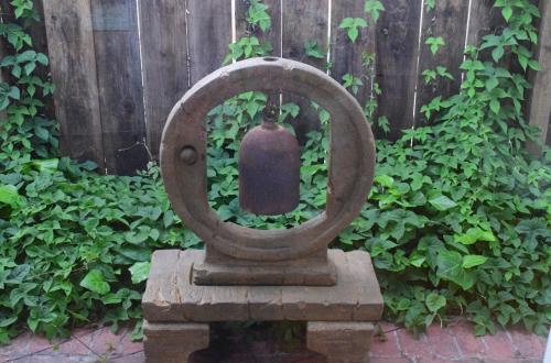 a statue of a vase in front of a fence at Silicon Valley Palo Alto Stanford Prime Location in Palo Alto