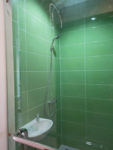 Ένα μπάνιο στο The Holiday Guest House