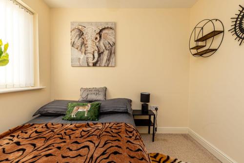 Ένα ή περισσότερα κρεβάτια σε δωμάτιο στο 2 bed apartment in the heart of Warrington