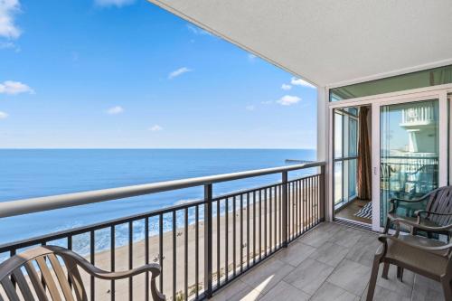 a balcony with a view of the ocean at The Grand Myrtle BAY VIEW 1503 Full New Remodel in Myrtle Beach