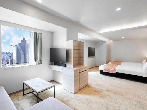 TV a/nebo společenská místnost v ubytování Daiwa Roynet Hotel Nagoya Shinkansenguchi