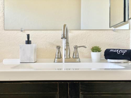 a kitchen counter with a sink and a faucet at Reno Gem 3 and a half Miles to DT, 40 Miles to Tahoe in Reno