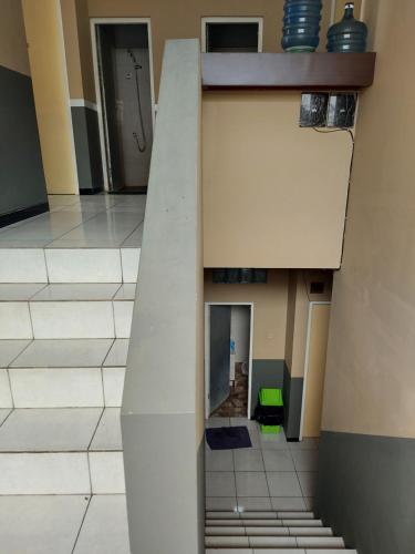 a view of a hallway in a building at Penginapan Sriwijaya Semarang in Jomblang