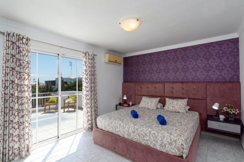 Postel nebo postele na pokoji v ubytování Villa Mannat by Villa Plus