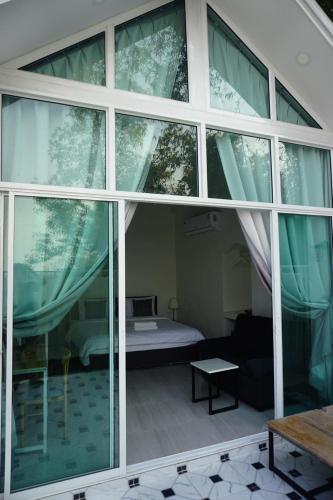 Foto dalla galleria di La Maison Blanche Chiang Rai Resort a Chiang Rai