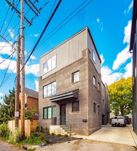 a brick building on a street at Historic German Village Industrial Masterpiece in Columbus