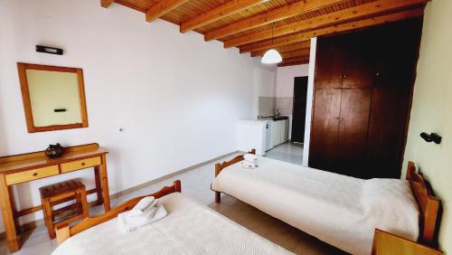 A bed or beds in a room at VILLA ELENA