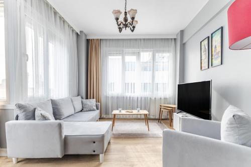 Khu vực ghế ngồi tại Modern Stylish Cozy Flat in the Heart of Kadikoy