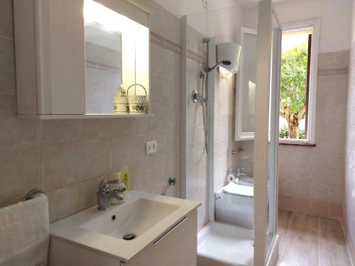 Ванна кімната в Appartamento vacanze Via Blum