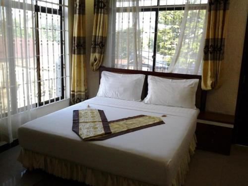 Łóżko lub łóżka w pokoju w obiekcie Best Point Hotel