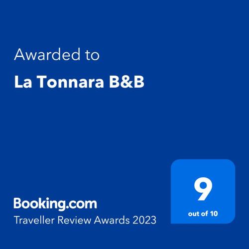 a screenshot of a cell phone with the text awarded to la torana bbb at La Tonnara B&B in Palmi