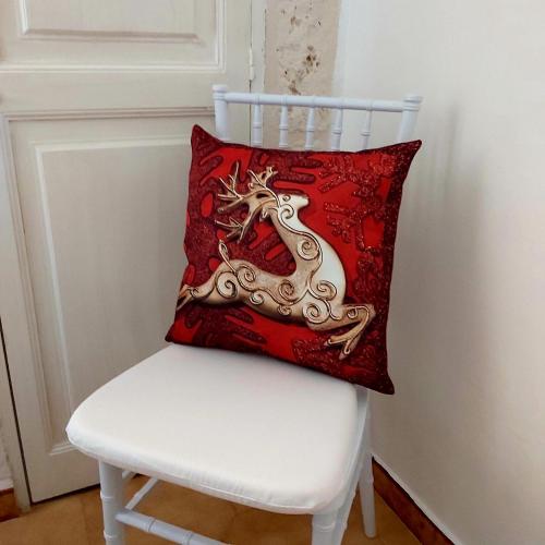 a white chair with a red pillow on it at Borgo Diaz in Cisternino