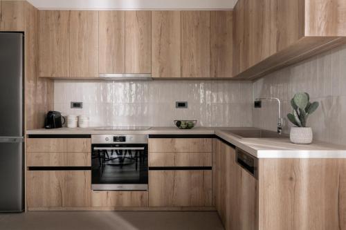 Cucina o angolo cottura di ALFA LUXURY APARTMENTS