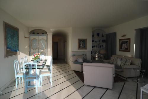 Χώρος καθιστικού στο Casa Magniflex - Sea view Flat with Swimming pool