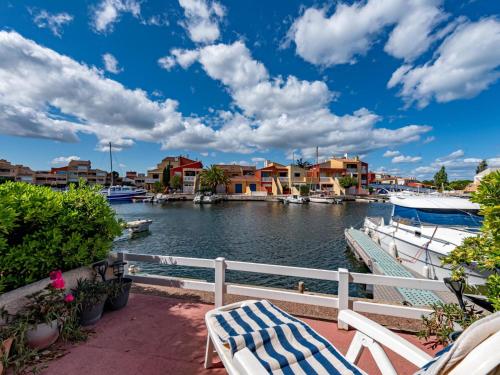 a view of a marina with boats in the water at Holiday Home Nautica-3 by Interhome in Le Barcarès