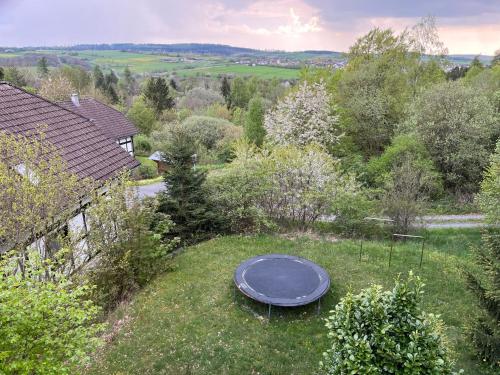 an overhead view of a trampoline in the grass at Apartment Martin by Interhome in Frankenau
