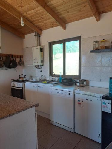 Kjøkken eller kjøkkenkrok på Cabaña en Colliguay