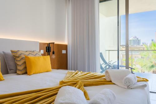 Postelja oz. postelje v sobi nastanitve Oasis Mar Beach Apartment