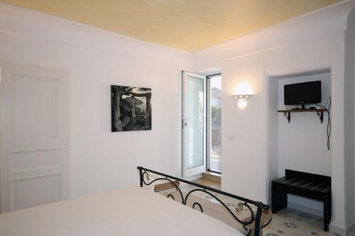 Posteľ alebo postele v izbe v ubytovaní Cavalluccio Marino