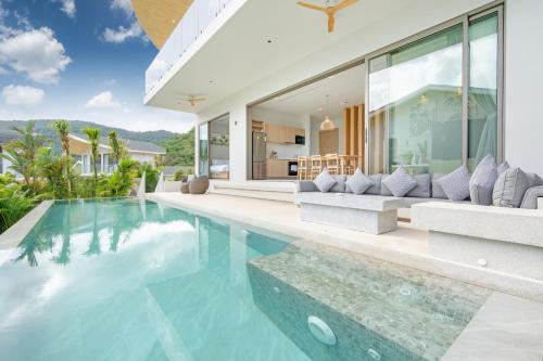 an image of a villa with a swimming pool at Himmapana Villas - Hills in Kamala Beach