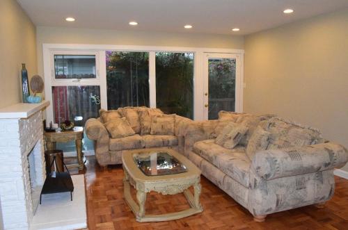 a living room with a couch and a coffee table at Palo Alto Quiet 1 Bedroom Stanford University in Palo Alto
