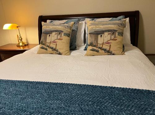 a bed with two pillows on top of it at Palo Alto Quiet 1 Bedroom Stanford University in Palo Alto
