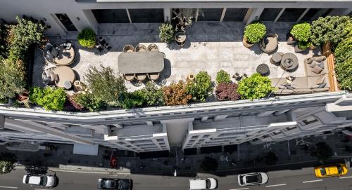 an overhead view of a building with plants on it at The Stay Boulevard Nisantasi in Istanbul